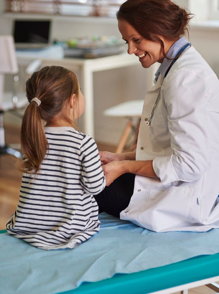 doctor talking to kid