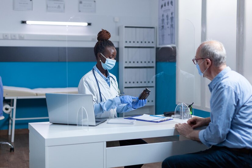 elderly man consulting in professional doctor