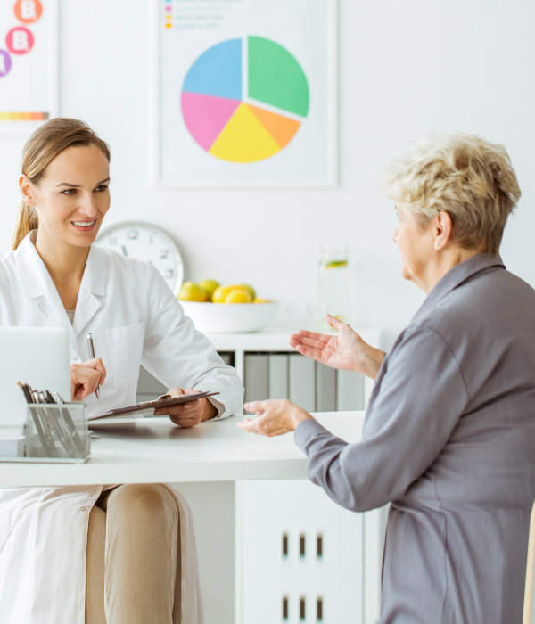 doctor with senior woman