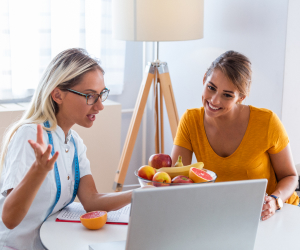 woman consulting to a nutritionist