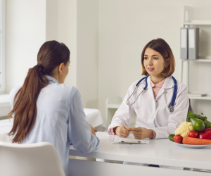 woman consulting to a doctor