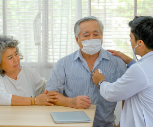 doctor checking up a patient's heart