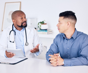 doctor talking to his patient