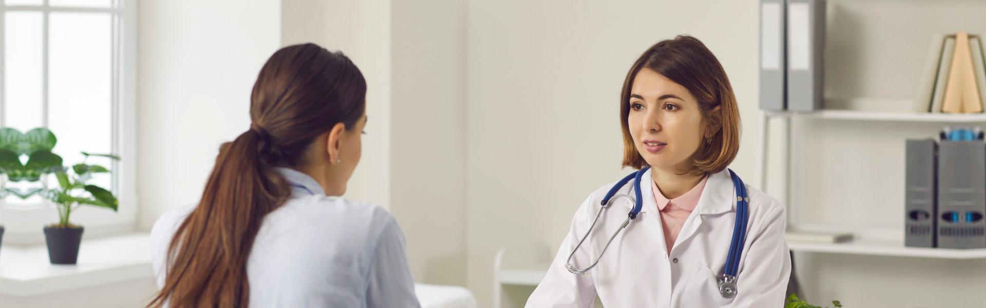 woman consulting to a doctor