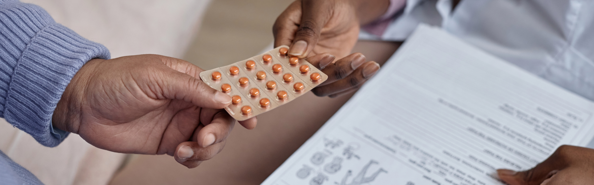 doctor giving medicine to patient