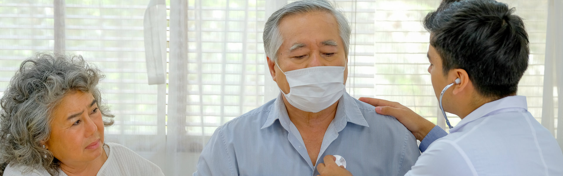 doctor checking up a patient's heart