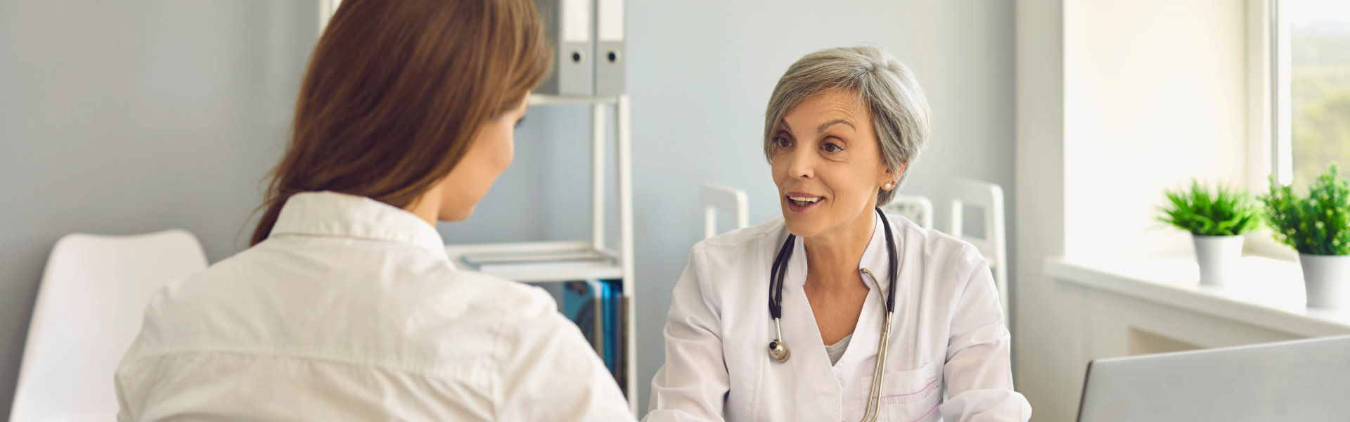 young woman consulting to doctor